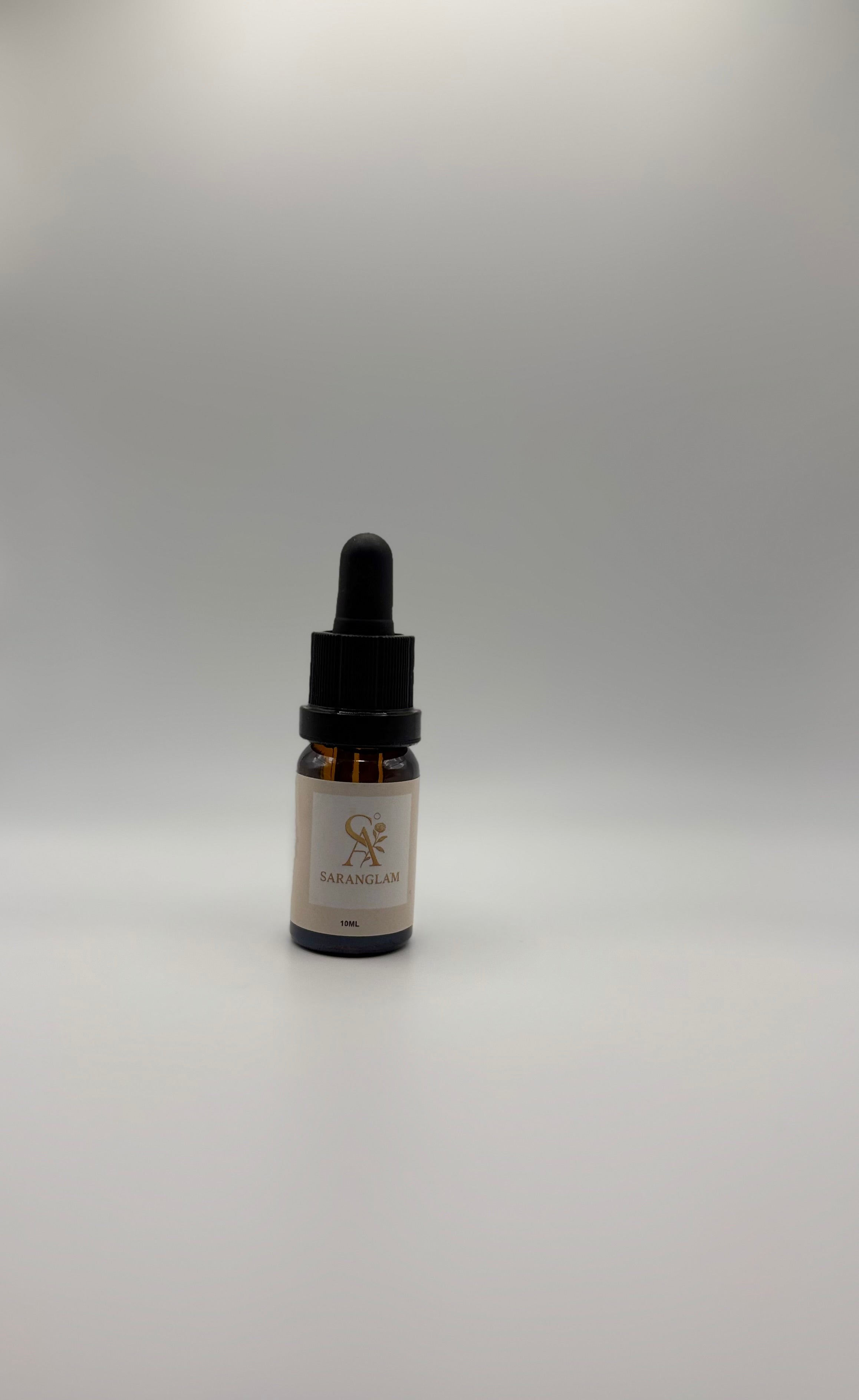 Image of Flacon d'huile de soin visage nuit Saranglam, essentiel du coffret soin visage nuit pour le rituel du soir.